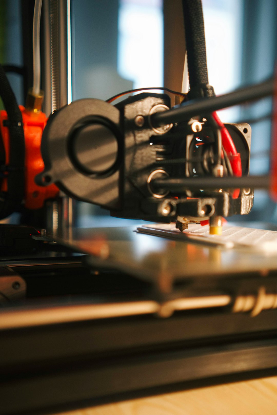 3D printer creating a plastic part