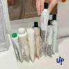 S393bfab19d2e4e80b6f1c22ec1fd95dca.webp 7-Slot Transparent Cosmetics Organizer