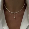 S7b5d7227447346d7afcd2719b9450cf0P.webp Tassel and Imitation Pearl Necklace