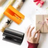 Sf7087a1161fe4fbc85f4d8bb96981addf.webp Sliding Gift Wrap Cutter